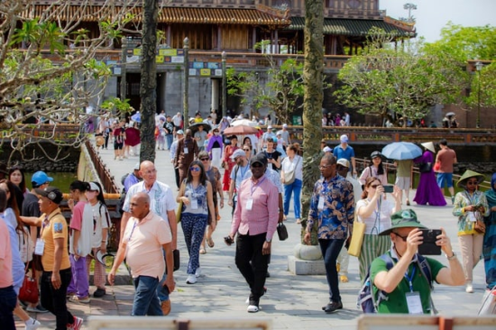 Tourists visit Hue Imperial City.